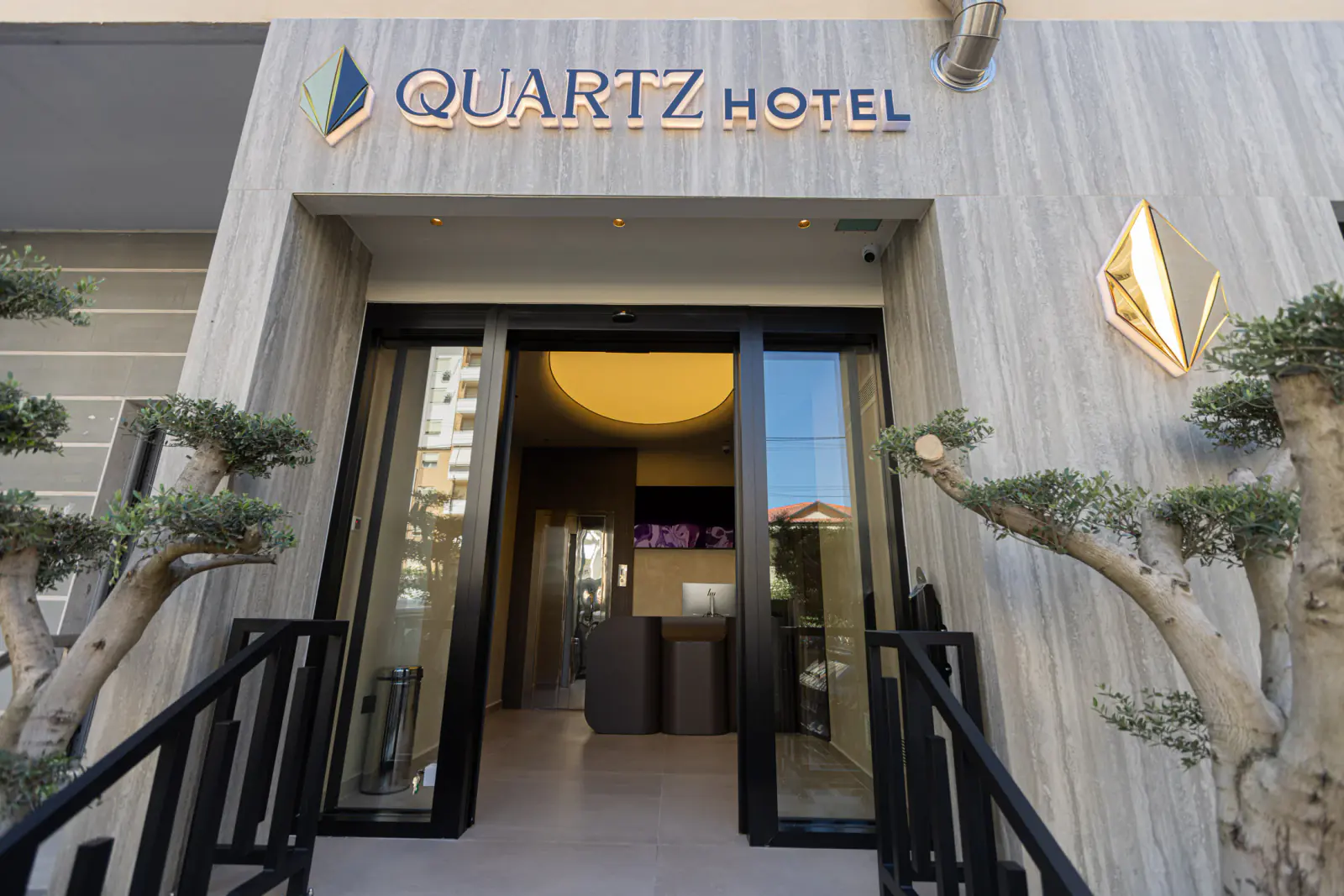 Signed entrance to Quartz Hotel in Vlorë